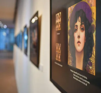 Framed portrait of a woman in an art gallery, with other artwork blurred along the hallway wall.